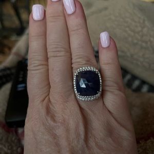 Beautiful sapphire ring with double diamond halo and white gold.